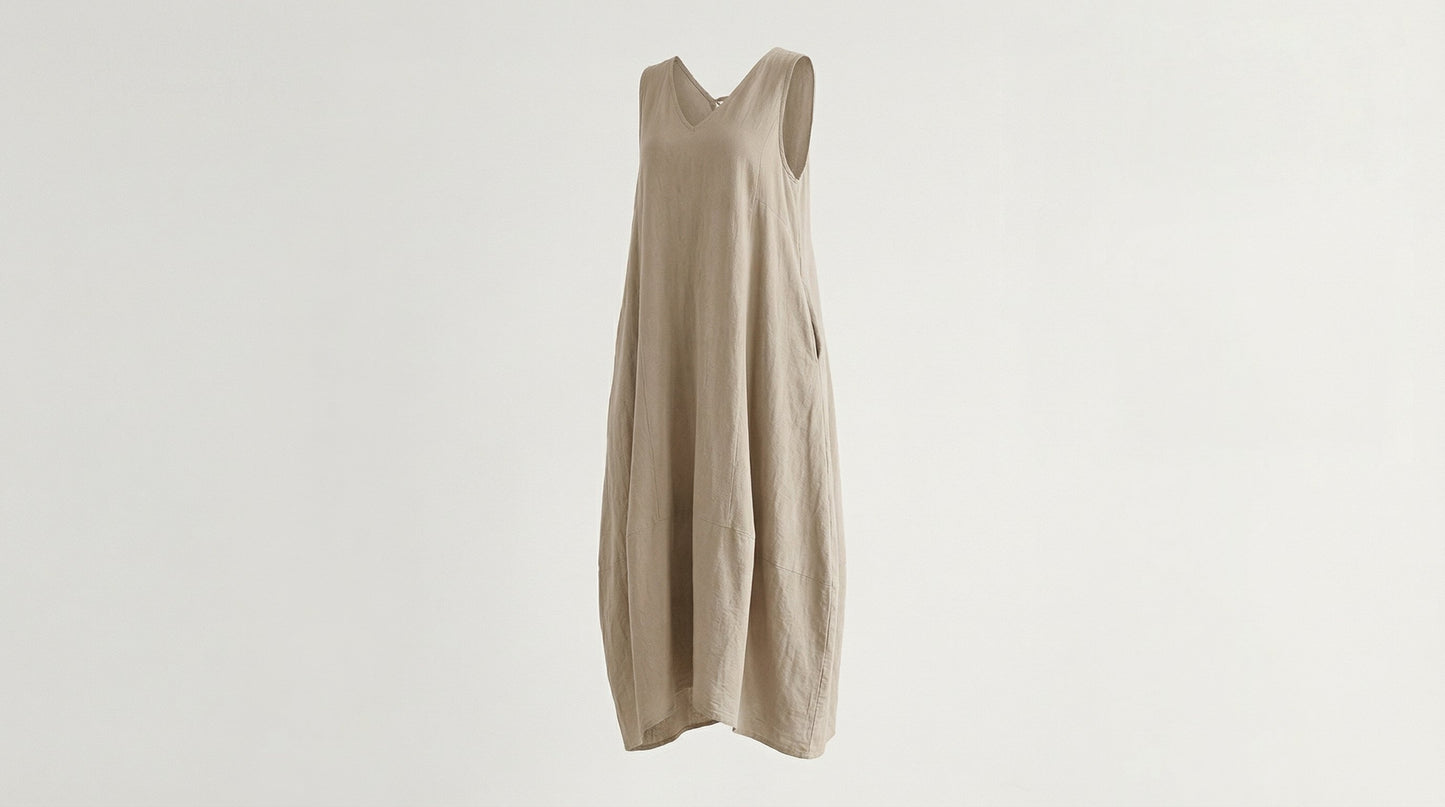 Beige sleeveless dress on a light gray background